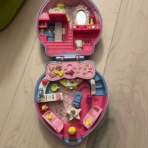 VINTAGE POLLY POCKET WITH A DOLL